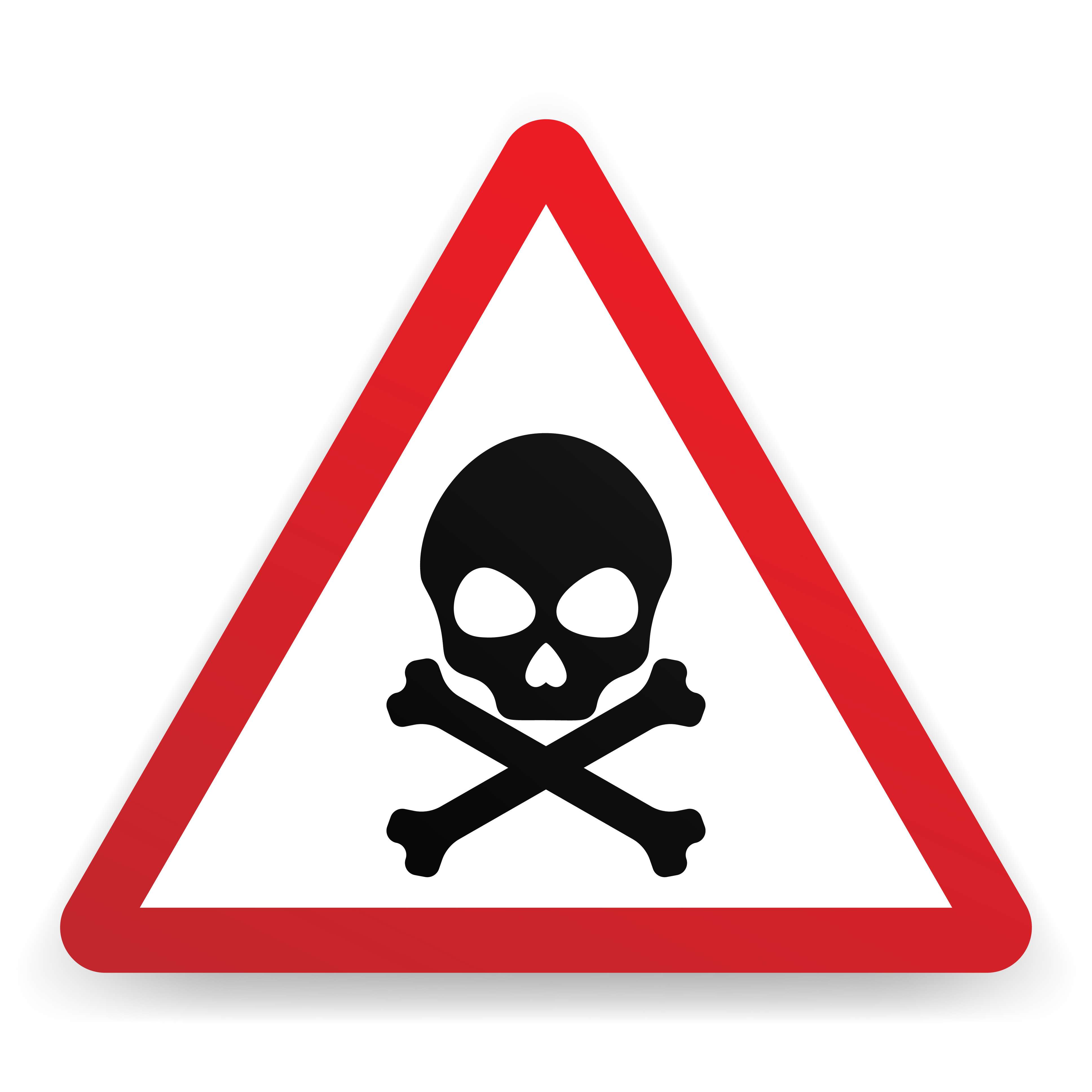Poisonous for Dogs - a skull and crossbones sign in a red triangle